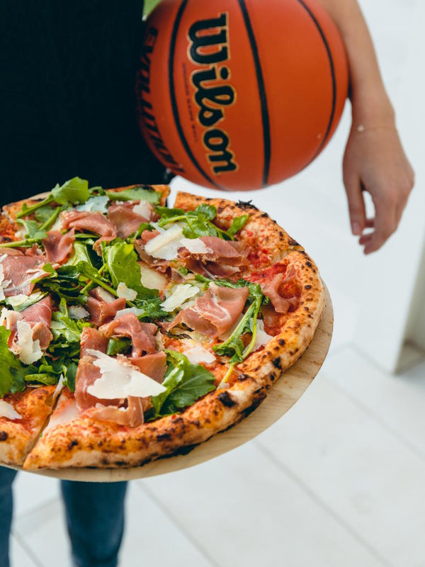 Margherita al Crudo pizza with basketball for March Madness