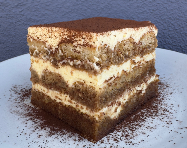 Our Tiramisu is a layered dream of espresso-soaked ladyfingers, whipped mascarpone cream and a fine dusting of cocoa.