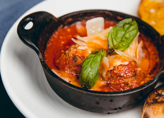 Polpette al Forno (meatballs in San Marzano DOP sauce) with basil