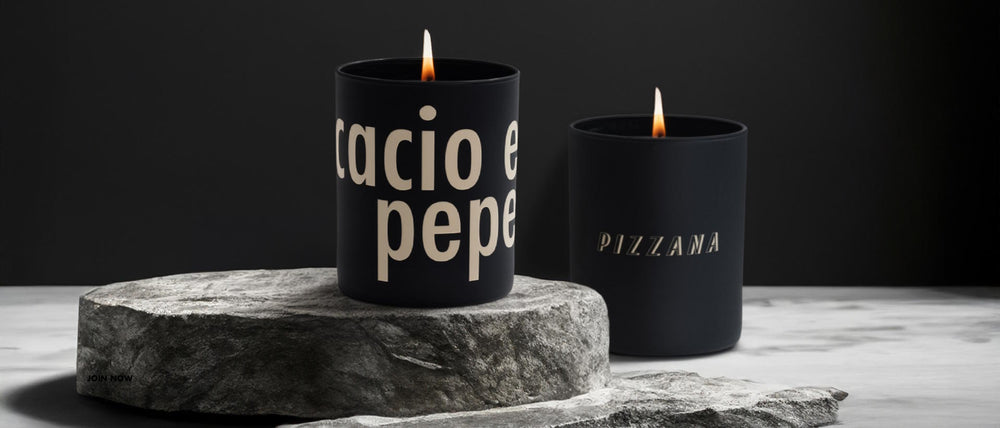 Pizzana Cacio e Pepe candle made with Joya in a modern black vessel.