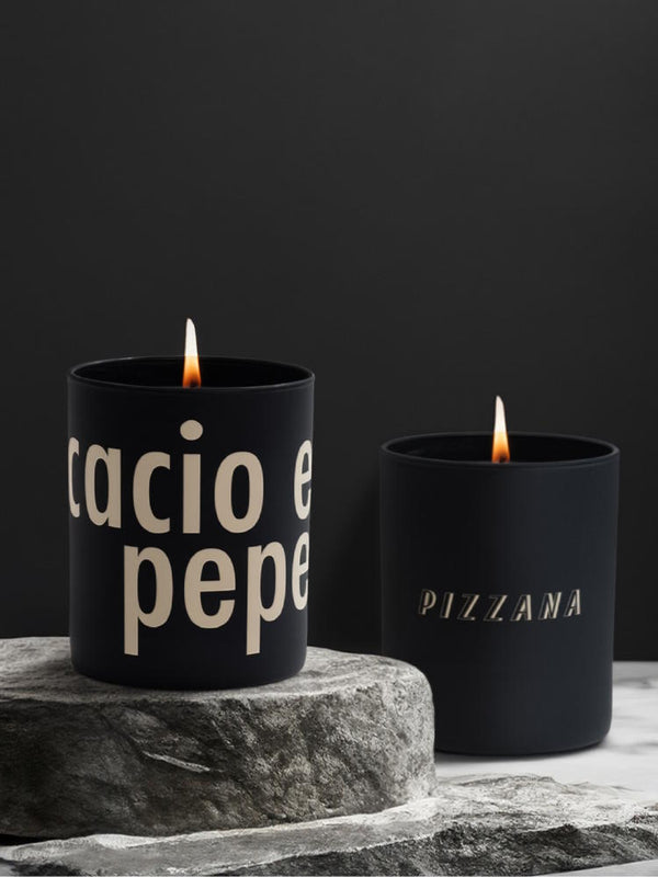 Pizzana Cacio e Pepe candle made with Joya in a modern black vessel.