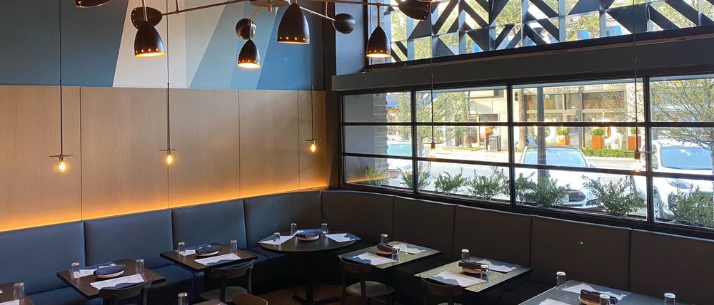 Pizzana Dallas pizza restaurant offering a chic ambiance and flooded with natural light