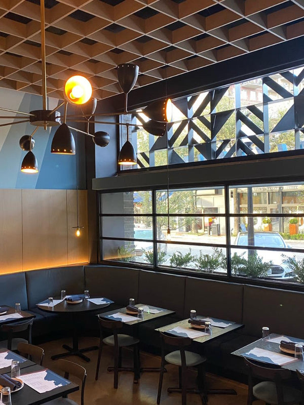 Pizzana Dallas pizza restaurant offering a chic ambiance and flooded with natural light