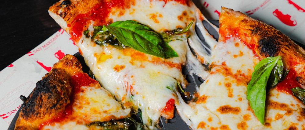 Neapolitan Margherita pizza cheese pull