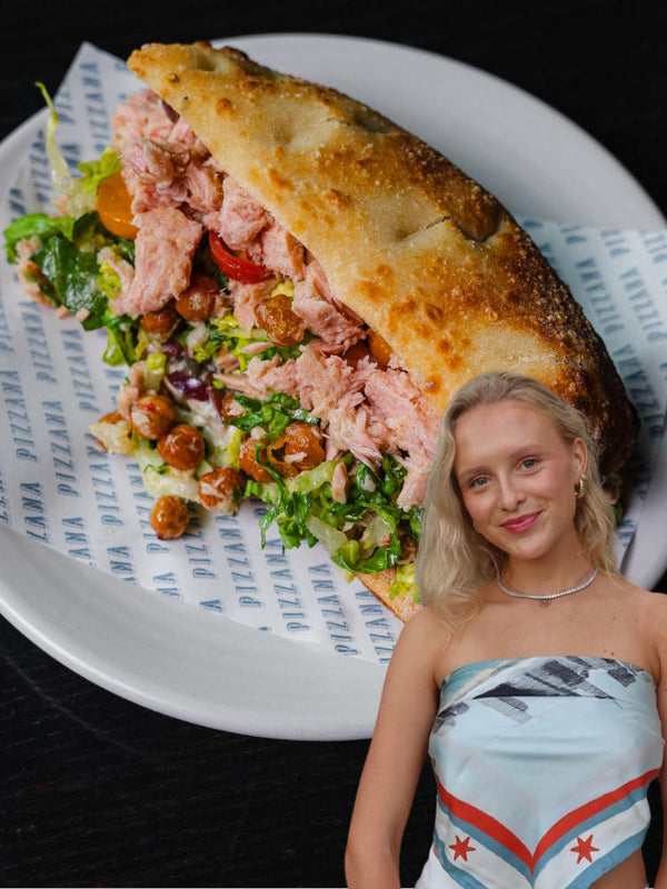 A tuna sandwich on focaccia with an image of influencer Brett Chody of Brett’s Bites