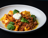 Pappardelle alla Bolognese with pappardelle pasta, bolognese and parmigiano crema