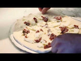 Video of Neo Margherita pizza being assembled and added to wood fired oven