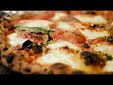 Video of Margherita pizza fresh out of oven with melted cheese bubbling