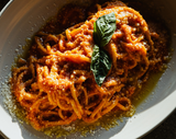 Closeup of Spaghetti al Pomodoro with spaghetti pasta, san marzano and basil
