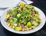 Chop insalata with greens, salami, olive and chickpea