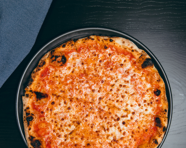 Classic Cheese pizza with melted cheese and san marzano dop
