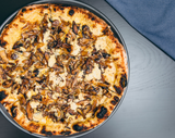 Vegan Funghi pizza with seasonal mushroom and vegan cauliflower besciamella